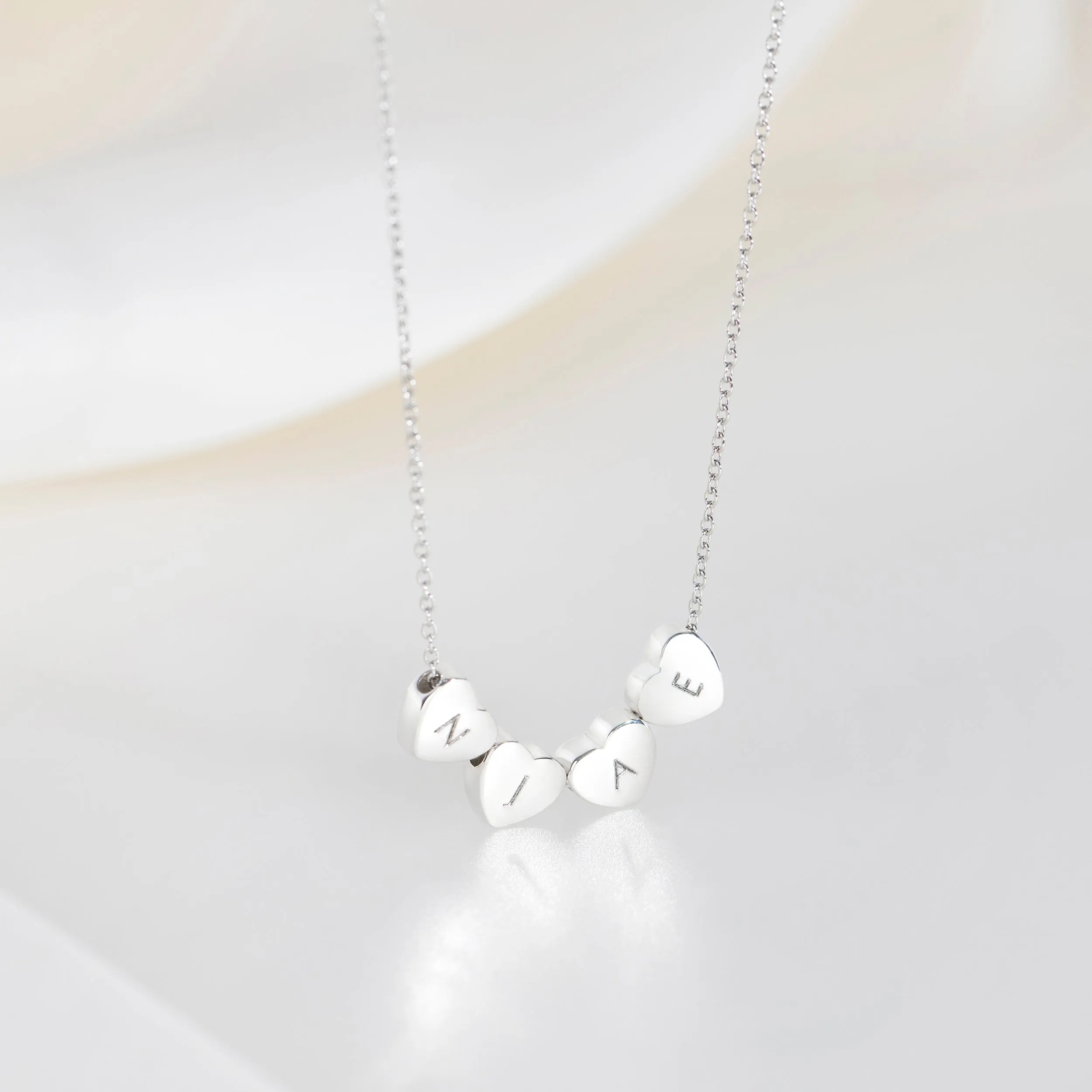 Amo Heart Quadruple Bead Necklace in Silver