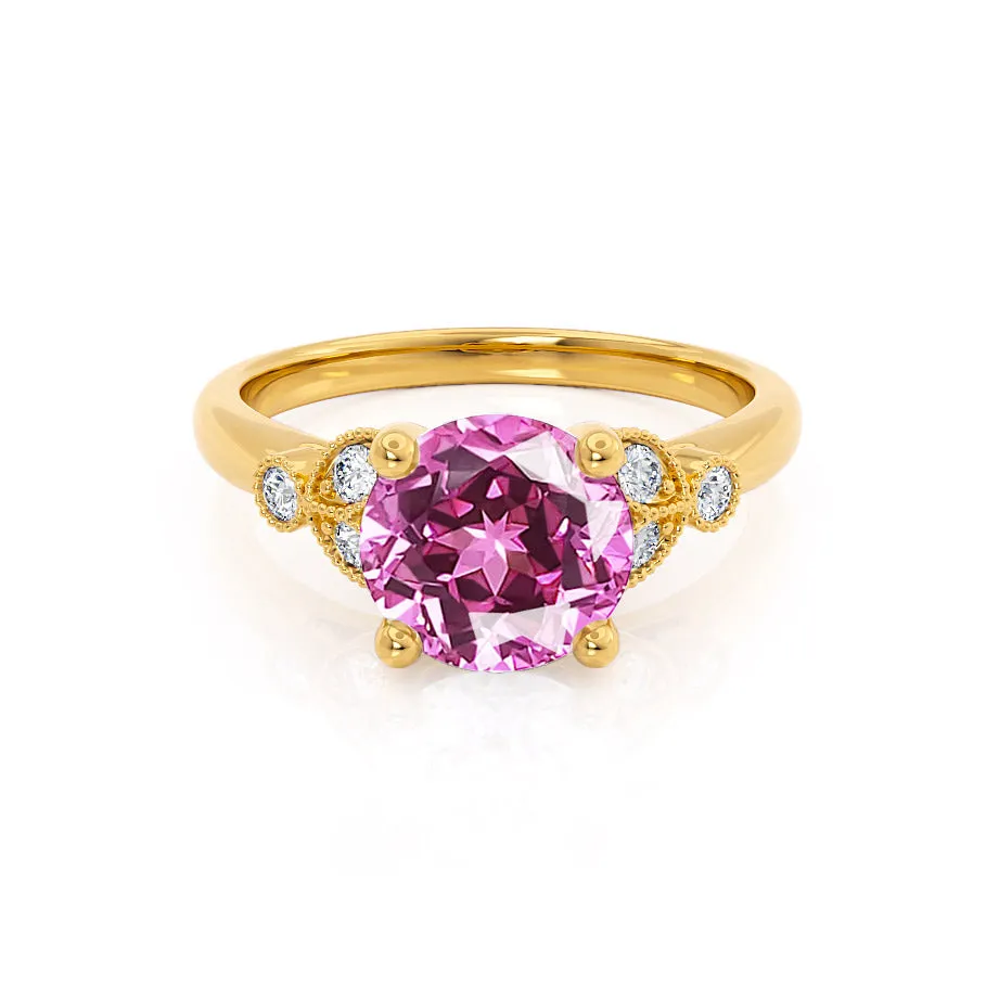 DELILAH - Chatham® Round Pink Sapphire 18k Yellow Gold Shoulder Set Ring