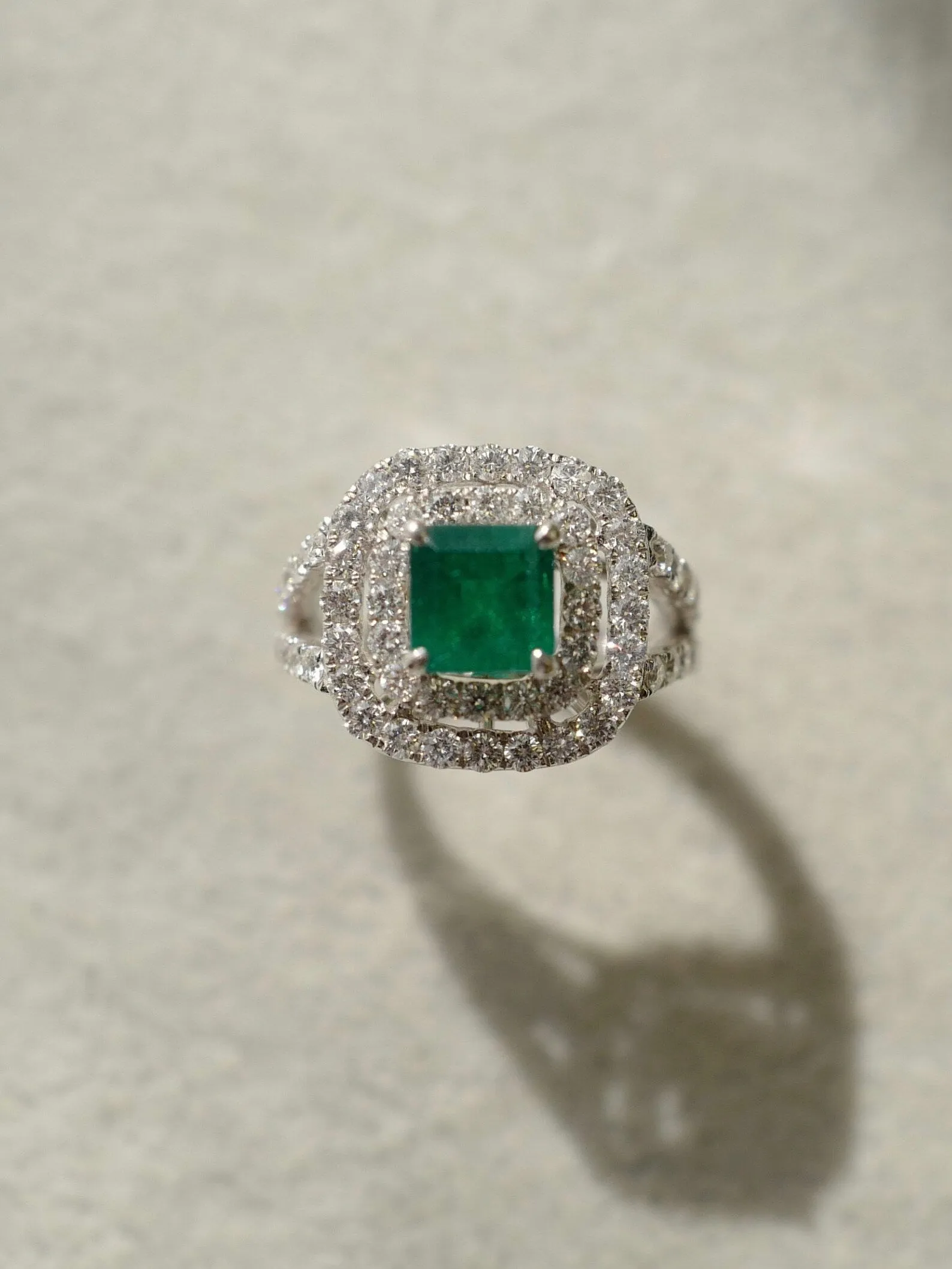 Emerald and Diamond Double Halo Ring in White Gold