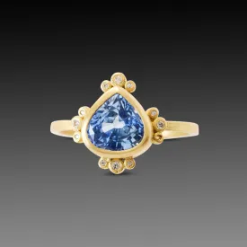 Pear Sapphire Ring with Diamond Trios